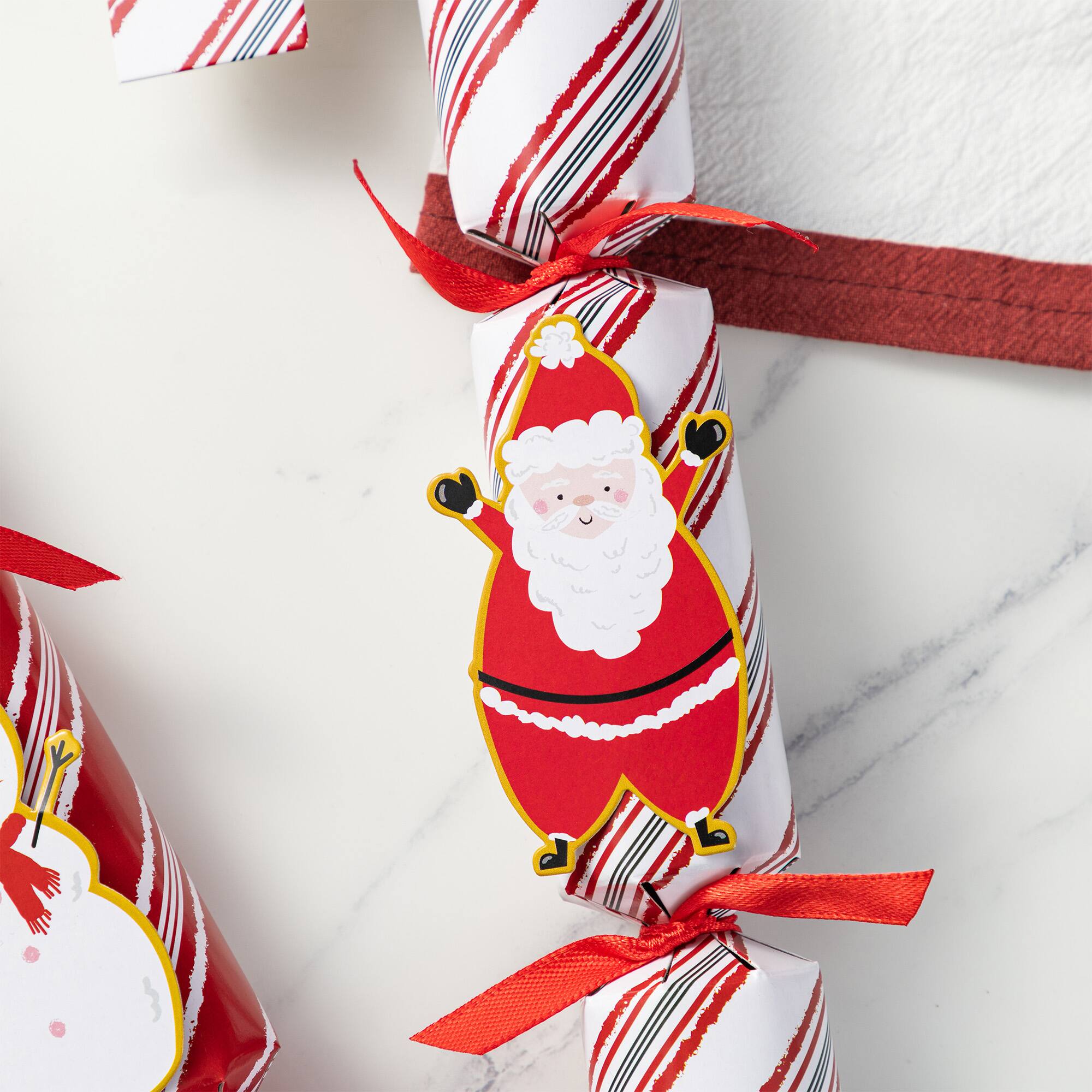 Glitzhome® 12PK 1.25"D x 10"H Candy Cane Christmas Party Crackers with Gift Contents